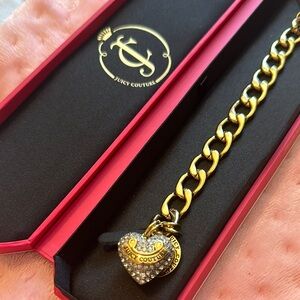 Juicy Couture Gold and Silver Bracelet with Elegant Design
